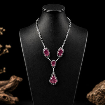 Purple Spiny Oyster lariat handcrafted by Native American artist Augustine Largo