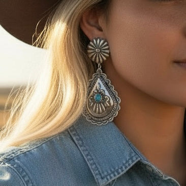 Kingman Turquoise earrings handcrafted by Native American artist Eugene Charlie