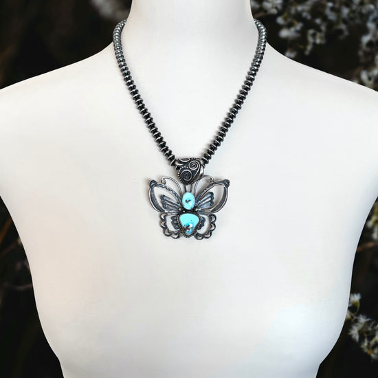 Golden Hills Turquoise pendant handcrafted by Native American artist Shawn Cayatineto
