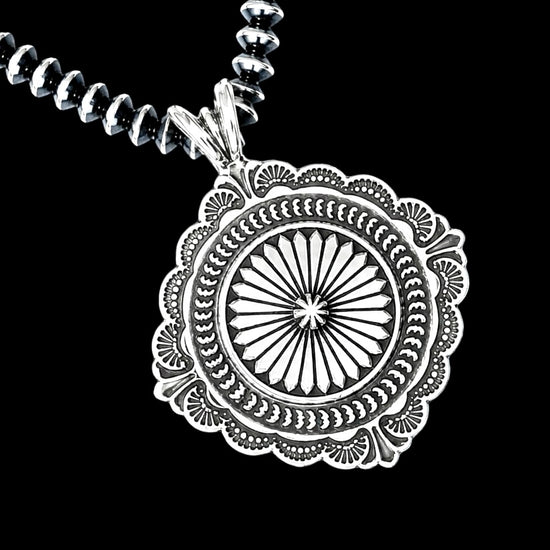 Sterling Silver pendant handcrafted by Native American artist Sunshine Reeves