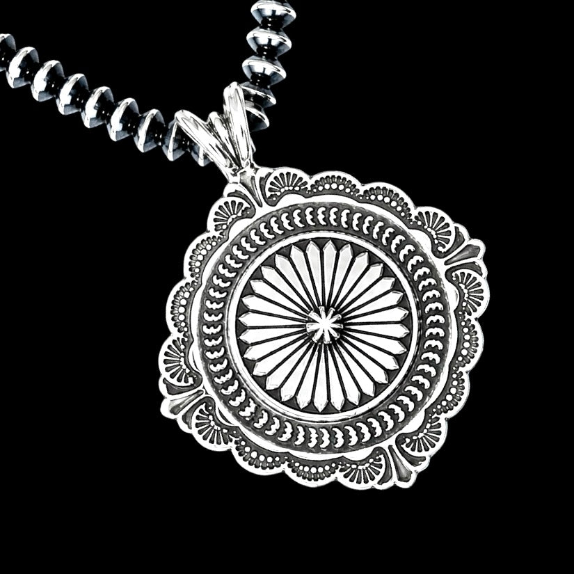 Sterling Silver pendant handcrafted by Native American artist Sunshine Reeves