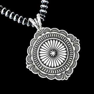 Sterling Silver pendant handcrafted by Native American artist Sunshine Reeves