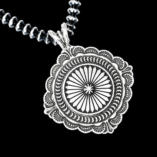 Sterling Silver pendant handcrafted by Native American artist Sunshine Reeves