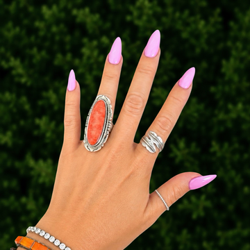 Orange spiny ring handcrafted by Native American artist Peggy Skeets