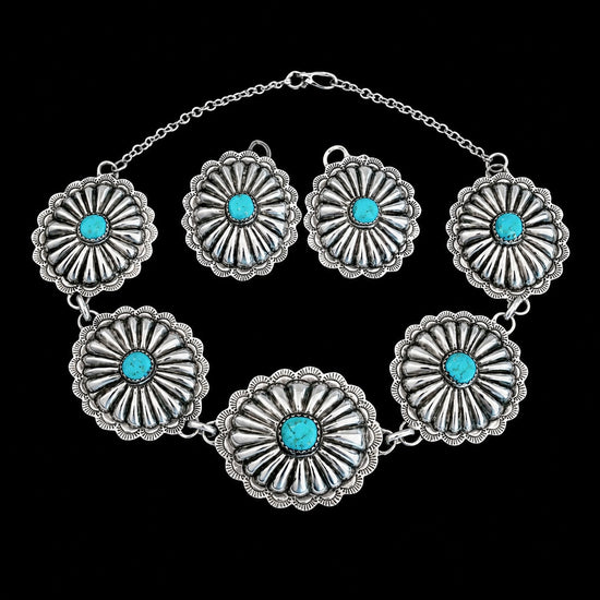Kingman Turquoise & Sterling Silver jewelry handcrafted by Native American artist Lorenzo and Jerilyn Chee