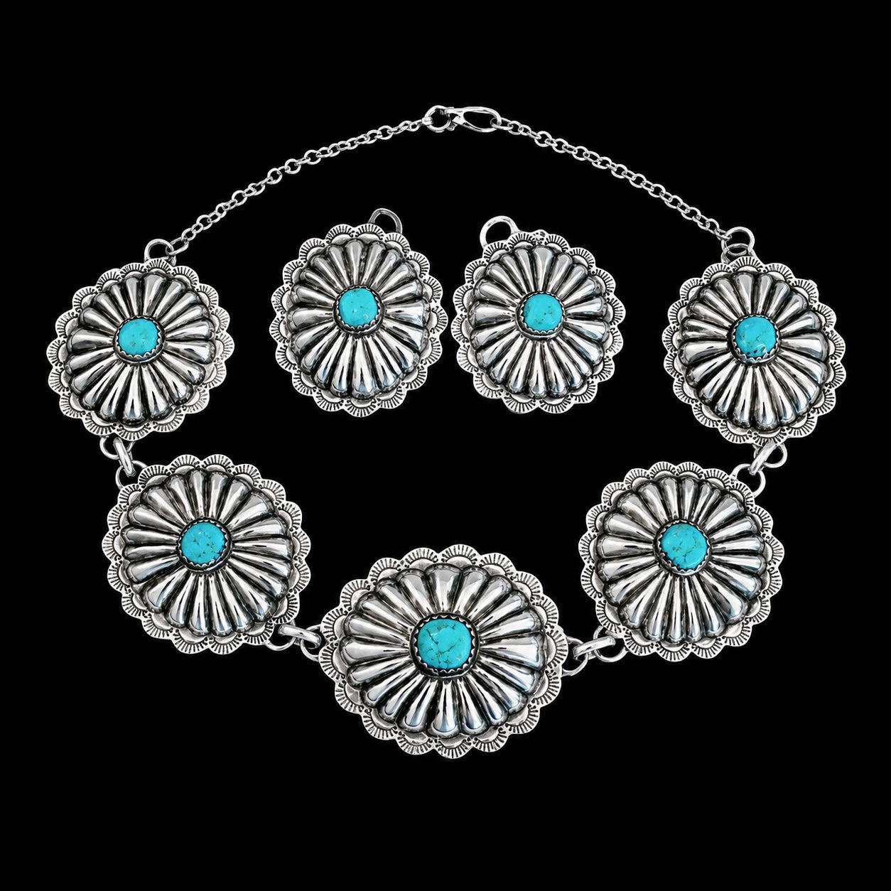Kingman Turquoise & Sterling Silver jewelry handcrafted by Native American artist Lorenzo and Jerilyn Chee