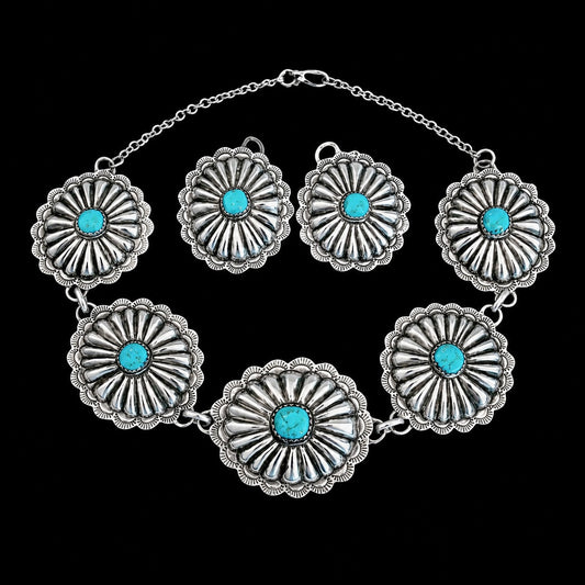 Kingman Turquoise & Sterling Silver jewelry handcrafted by Native American artist Lorenzo and Jerilyn Chee