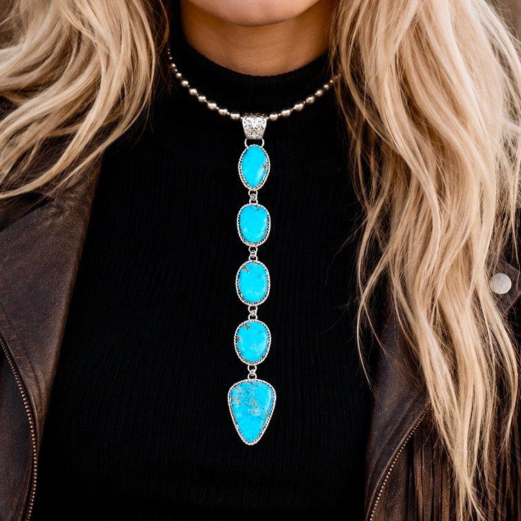 Kingman Turquoise pendant handcrafted by Native American artist Lorenzo and Jerilyn Chee