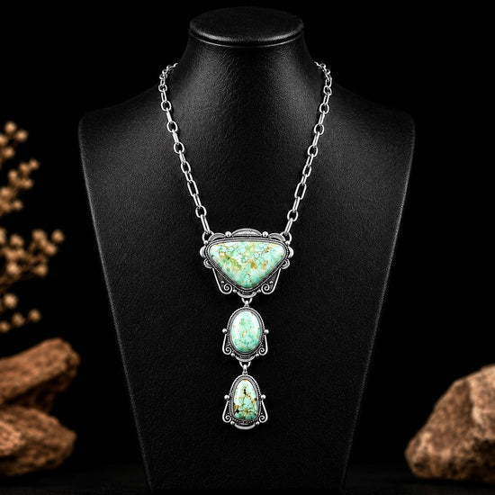 Kingman Turquoise lariat handcrafted by Native American artist Ronald Tom