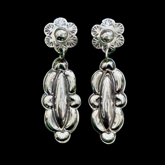 Sterling Silver Repoussé earrings handcrafted by Native American artist Tim Yazzie