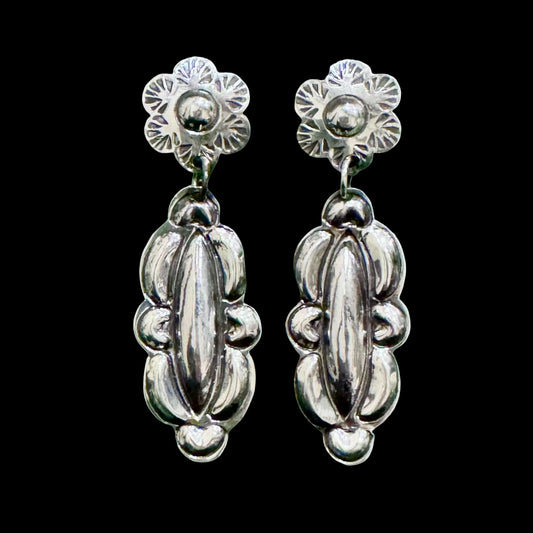Sterling Silver Repoussé earrings handcrafted by Native American artist Tim Yazzie