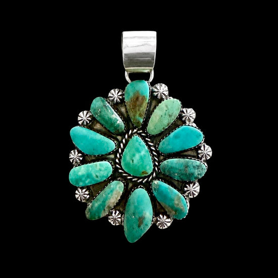 Turquoise cluster  necklace with silver clasp on a black background by Lorenzo and Jerilyn Chee