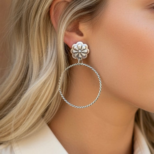 Sterling Silver earrings handcrafted by Native American artist Lavina Benally