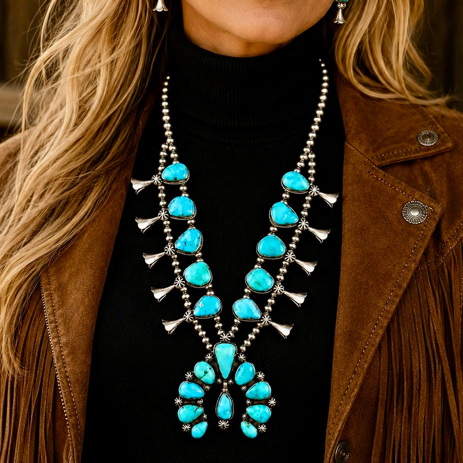 Natural Fox Turquoise squash blossom handcrafted by Native American artist Darrin Livingston