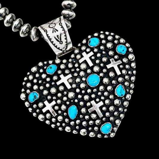 Sleeping Beauty Turquoise pendant handcrafted by Native American artist Akee Douglas