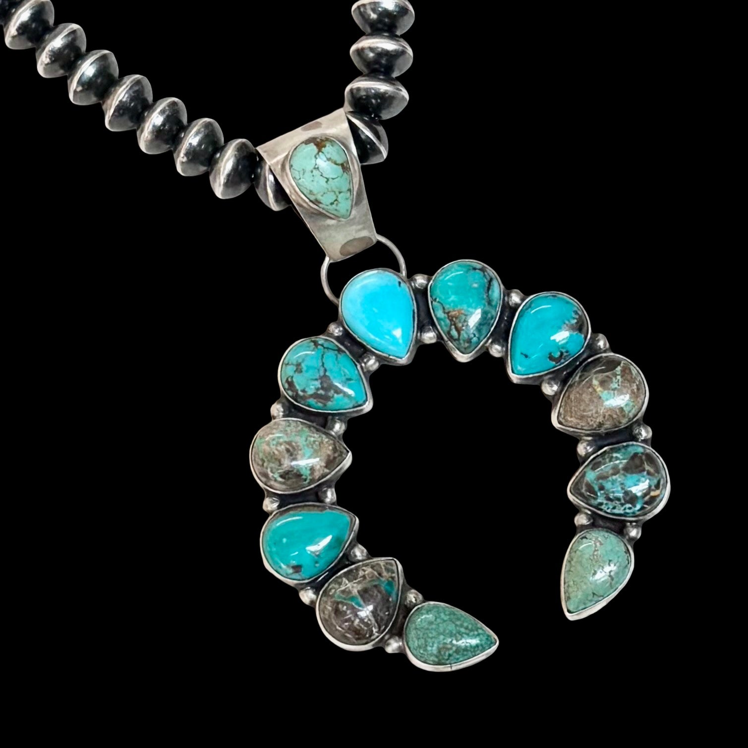 Carico Lake Turquoise pendant handcrafted by Native American artist Randall Endito