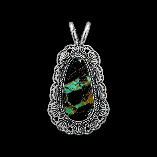 Blackjack Turquoise pendant handcrafted by Native American artist Sunshine Reeves