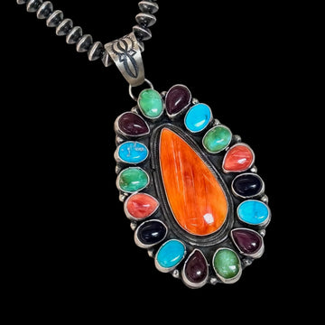 Multi-stone pendant handcrafted by Native American artist Ella Peters