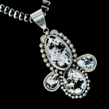 White Buffalo Dolomite pendant handcrafted by Native American artist Lucinda Linkin