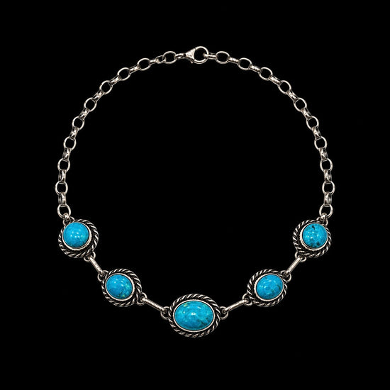 Kingman Turquoise choker handcrafted by Native American artist Augustine Largo ￼