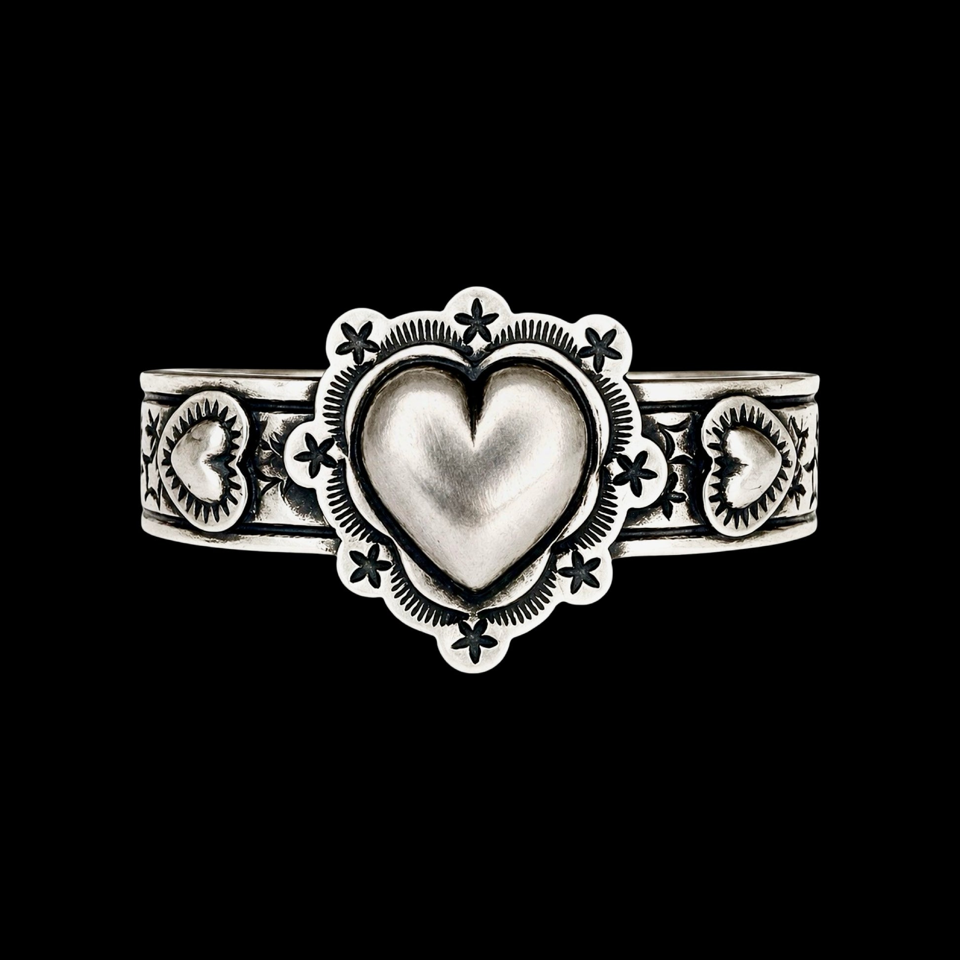 Sterling Silver cuff handcrafted by Native American artist Chris Etsitty