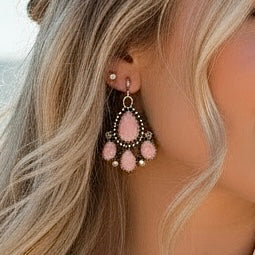 Pink Conch earrings handcrafted by Native American artist Chris Etsitty
