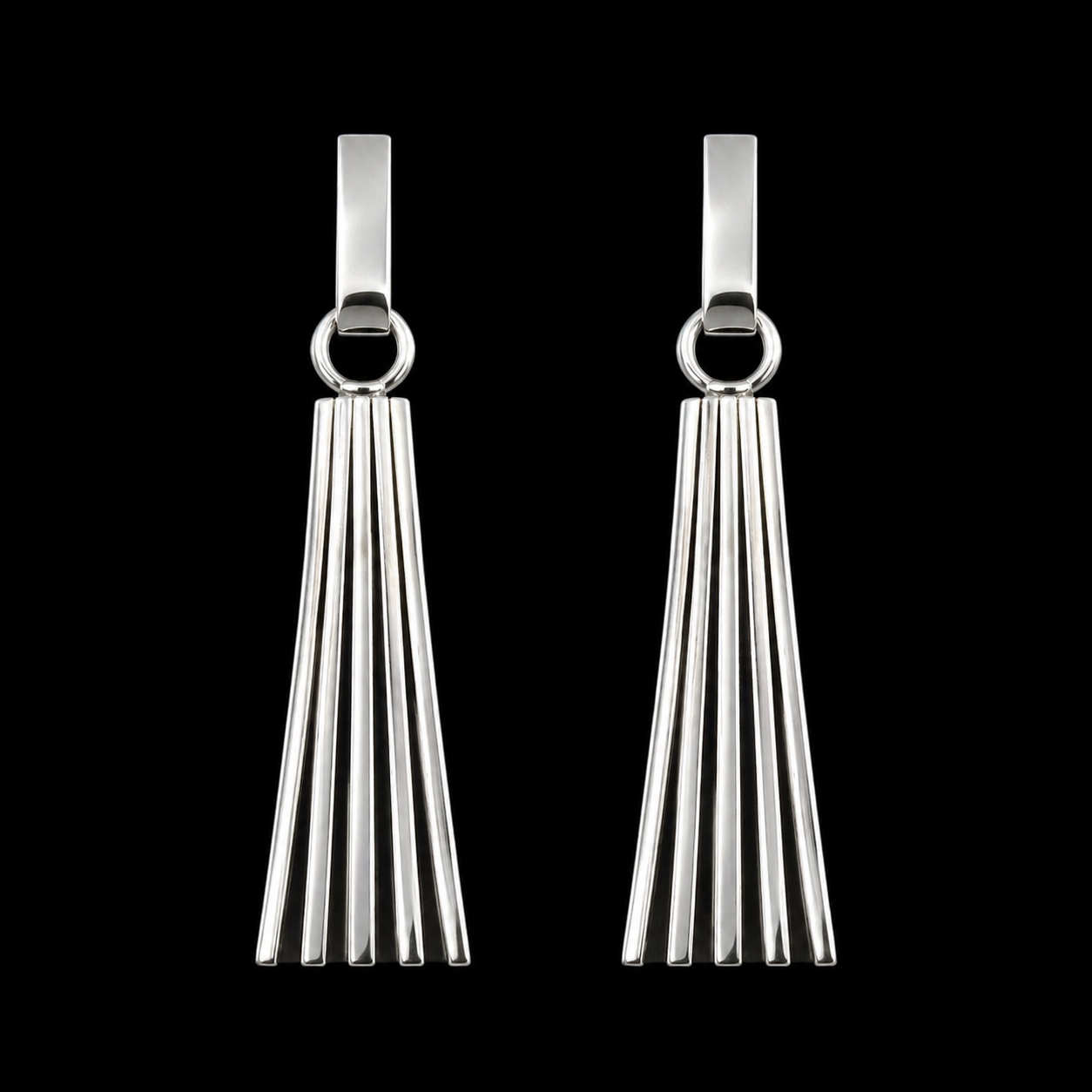 Sterling Silver earrings handcrafted by Native American artist Tom Hawk