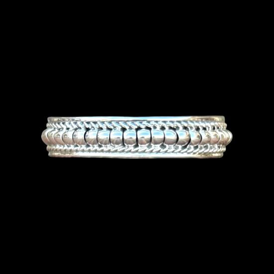 Rolled Sterling Silver cuff handcrafted by Native American artist Manvel Johnson