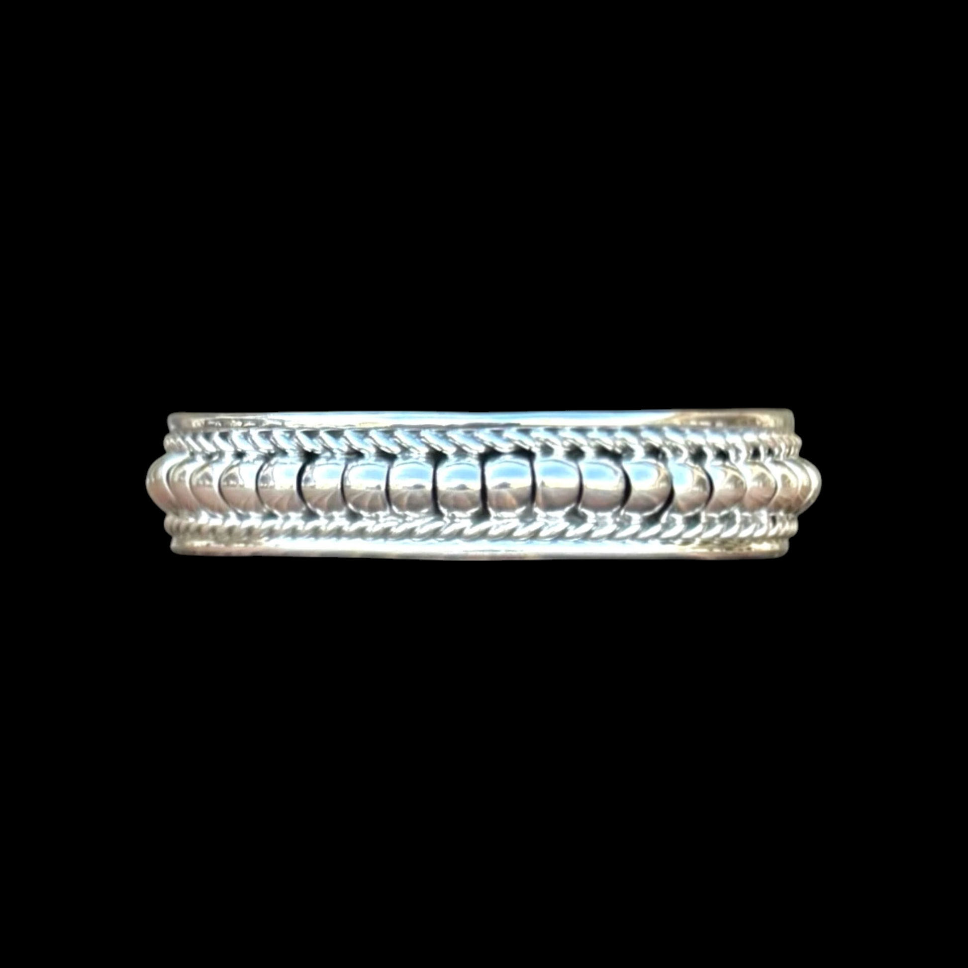 Rolled Sterling Silver cuff handcrafted by Native American artist Manvel Johnson