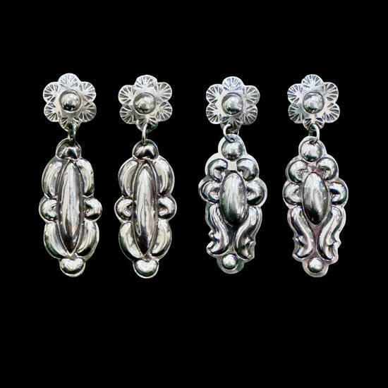 Sterling Silver Repoussé earrings handcrafted by Native American artist Tim Yazzie