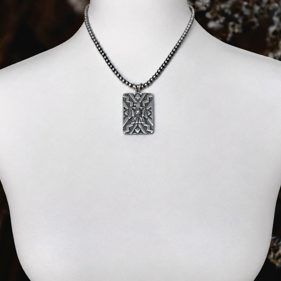 The Elirae Pendant Sterling Silver pendant handcrafted by Native American artist Bo Reeves