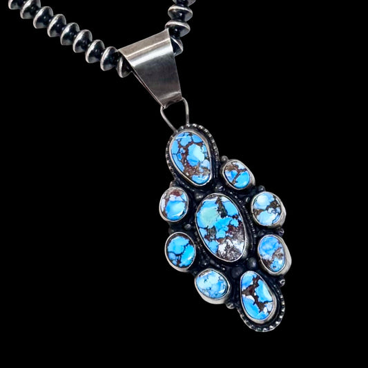 Golden Hills Turquoise pendant handcrafted by Native American artist Travis Jim