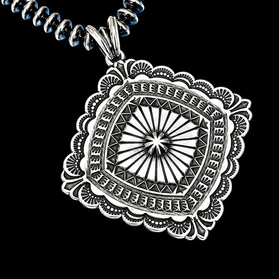 Sterling Silver pendant handcrafted by Native American artist Sunshine Reeves