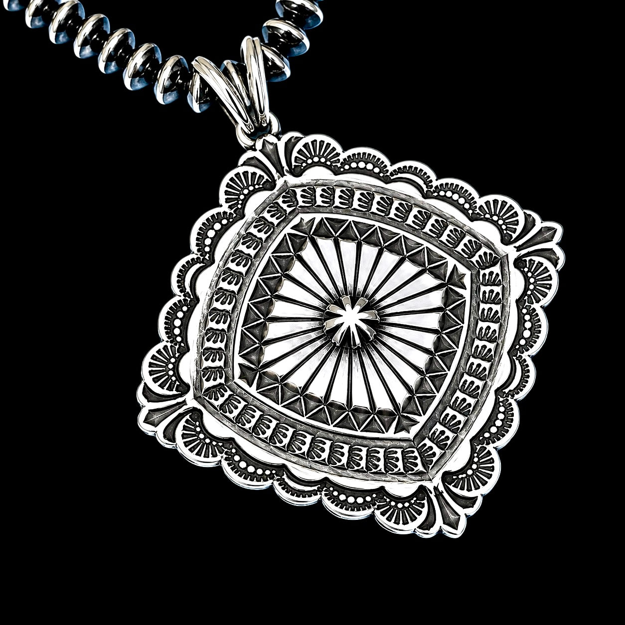 Sterling Silver pendant handcrafted by Native American artist Sunshine Reeves