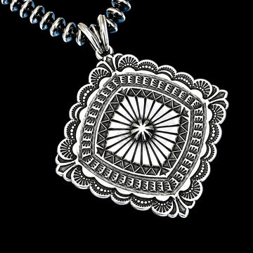 Sterling Silver pendant handcrafted by Native American artist Sunshine Reeves