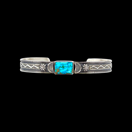 Webbed Kingman Turquoise cuff handcrafted by Native American artist Melvin Francis