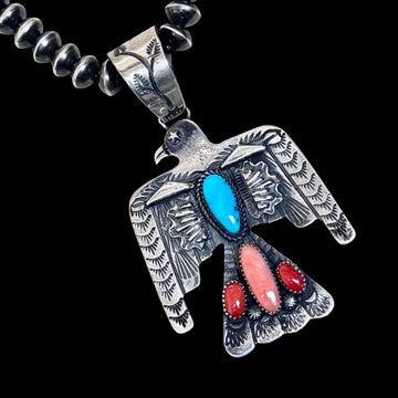 Multi-stone pendant handcrafted by Native American artist Richard Yazzie