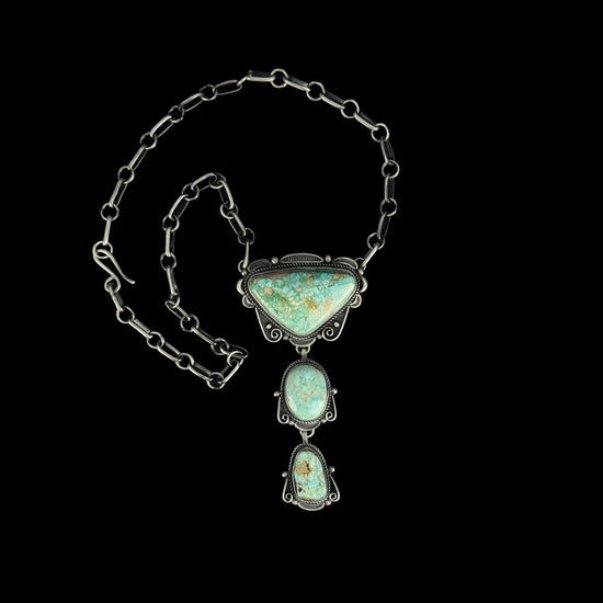 Kingman Turquoise lariat handcrafted by Native American artist Ronald Tom