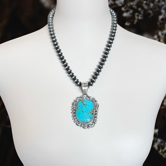 Kingman Turquoise pendant handcrafted by Native American artist Tillie Jon