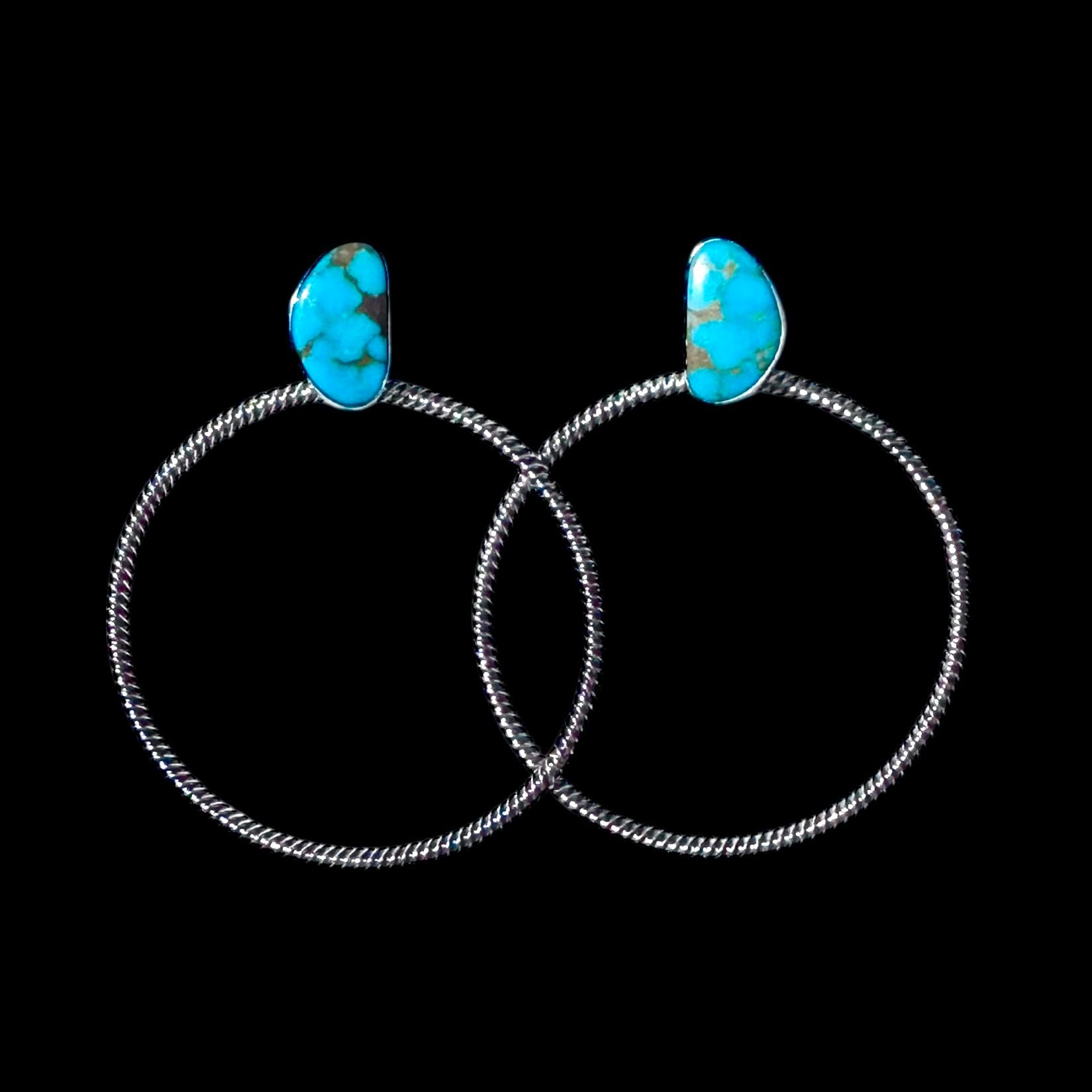 Kingman Turquoise Turquoise earrings handcrafted by Native American artist Verley Betone