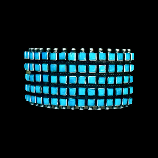 Natural Sleeping Beauty Turquoise bracelet handcrafted by Native American artist Raymond Betsoi