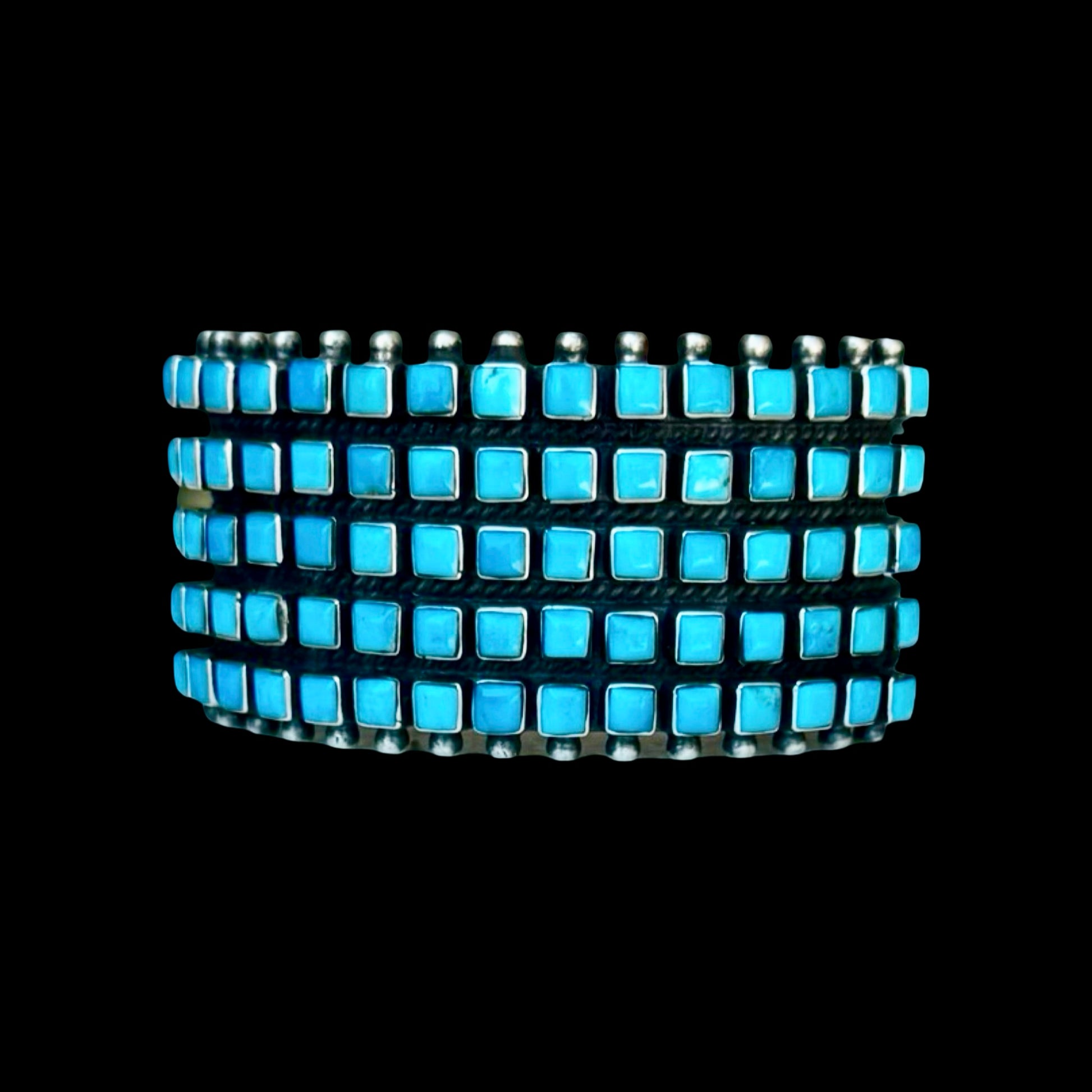 Natural Sleeping Beauty Turquoise bracelet handcrafted by Native American artist Raymond Betsoi