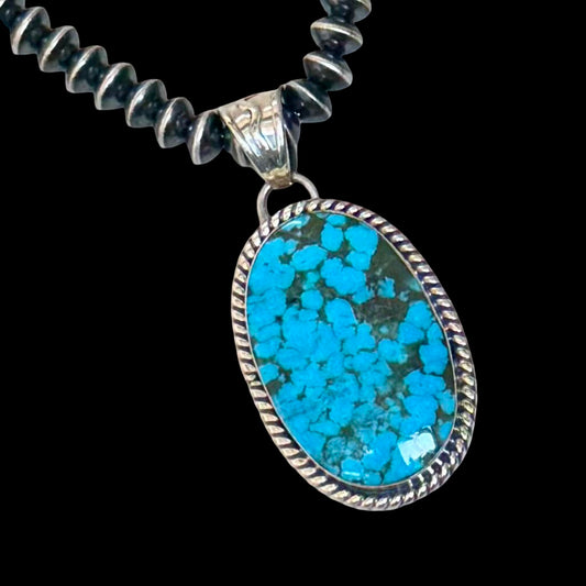 Kingman Turquoise pendant handcrafted by Native American artist Sheena Jack