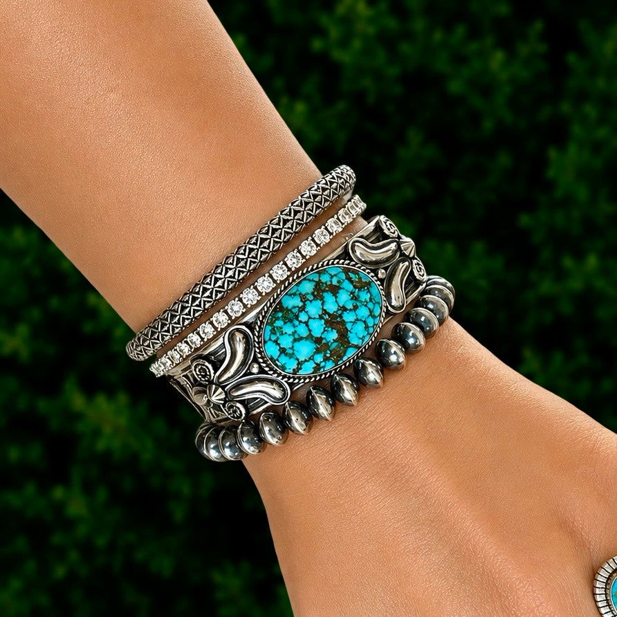 Natural Black Web Kingman Turquoise cuff handcrafted by Native American artist Andy Cadman