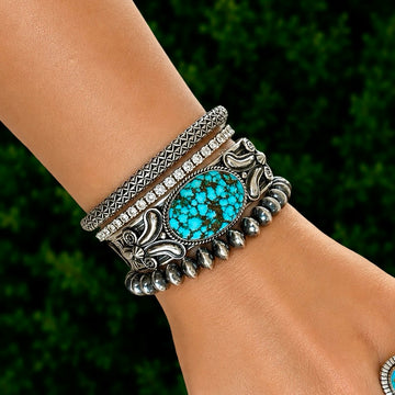 Natural Black Web Kingman Turquoise cuff handcrafted by Native American artist Andy Cadman