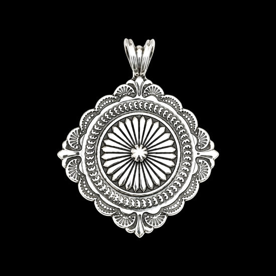 Sterling Silver pendant handcrafted by Native American artist Sunshine Reeves