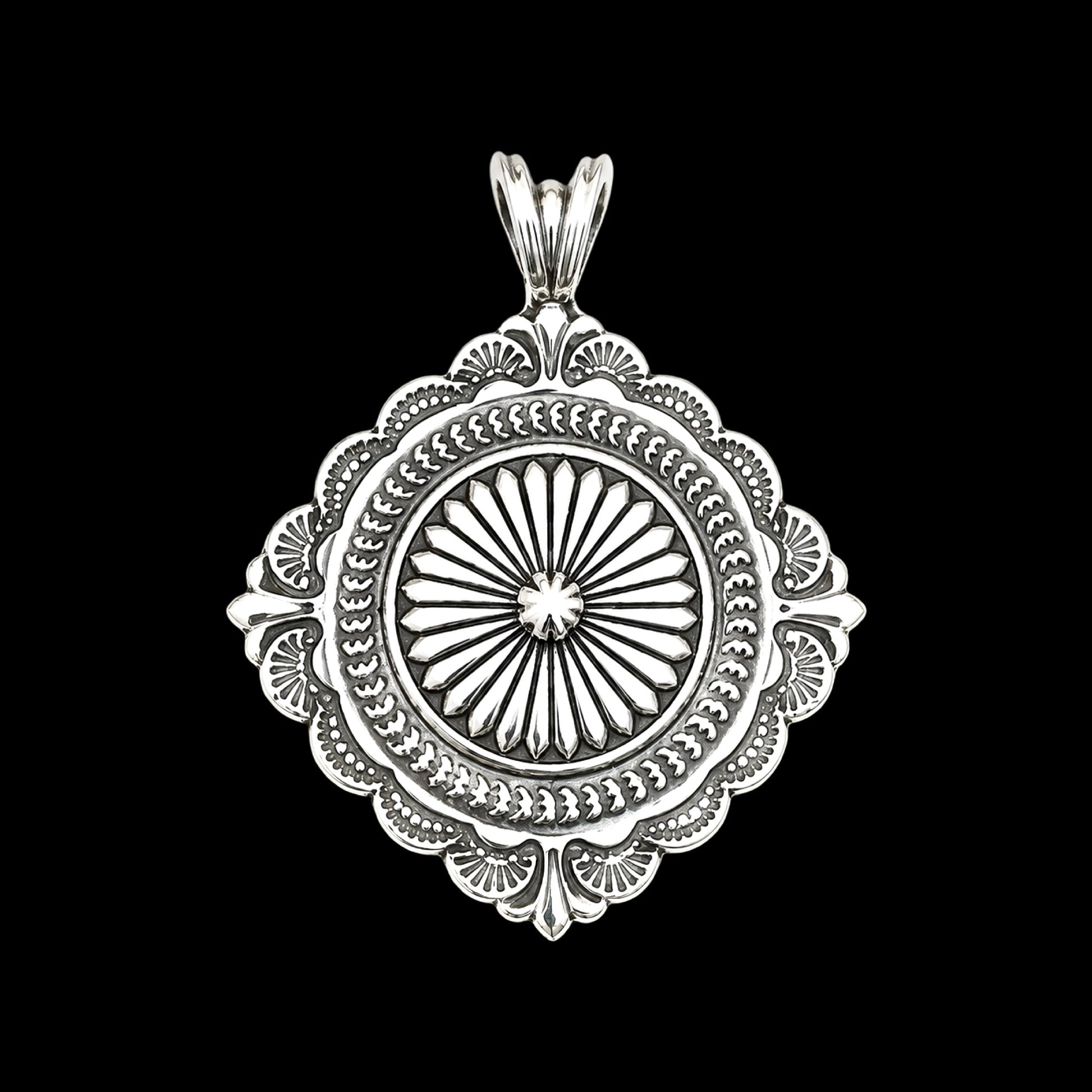 Sterling Silver pendant handcrafted by Native American artist Sunshine Reeves