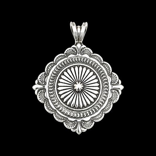 Sterling Silver pendant handcrafted by Native American artist Sunshine Reeves