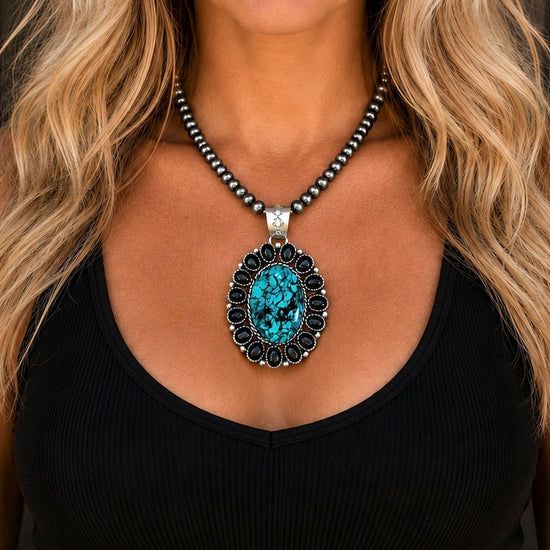 Kingman Turquoise & Black Onyx pendant handcrafted by Native American artist Lorenzo and Jerilyn Chee ￼