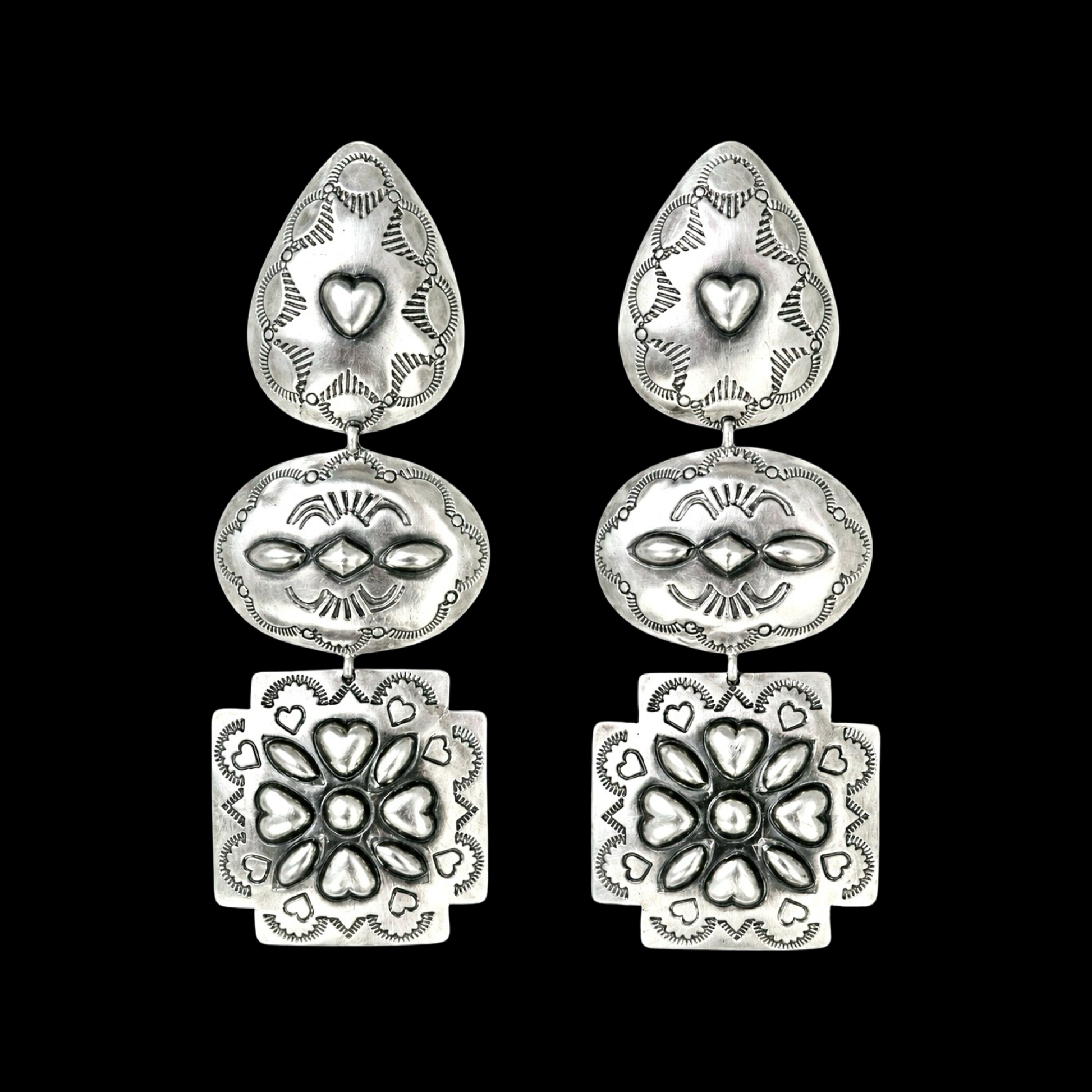 Sterling Silver earrings handcrafted by Native American artist Rita Lee